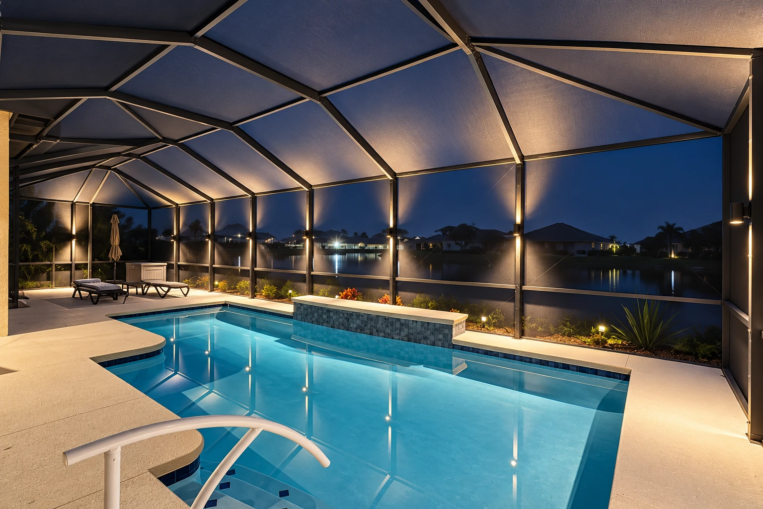 A screened patio enclosure surrounds a lit swimming pool beneath a dark paneled roof at night.